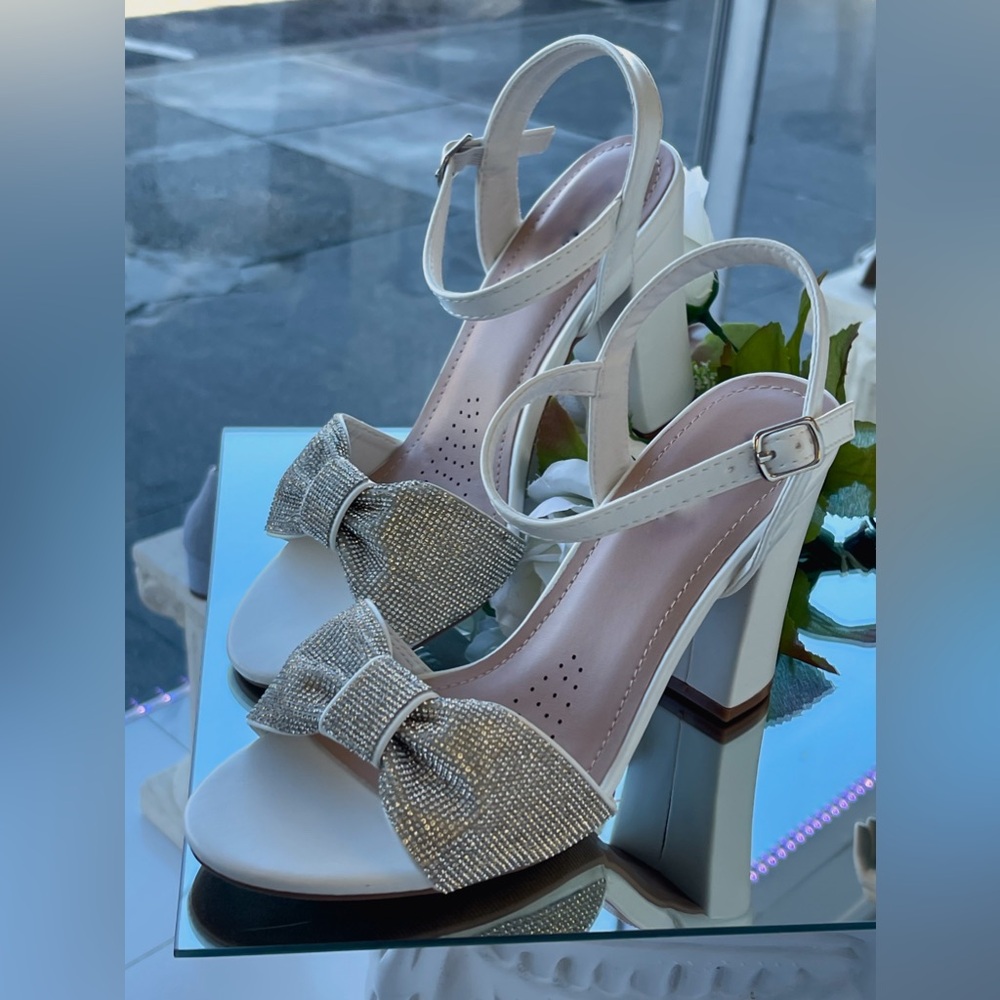 White heels with rhinestones